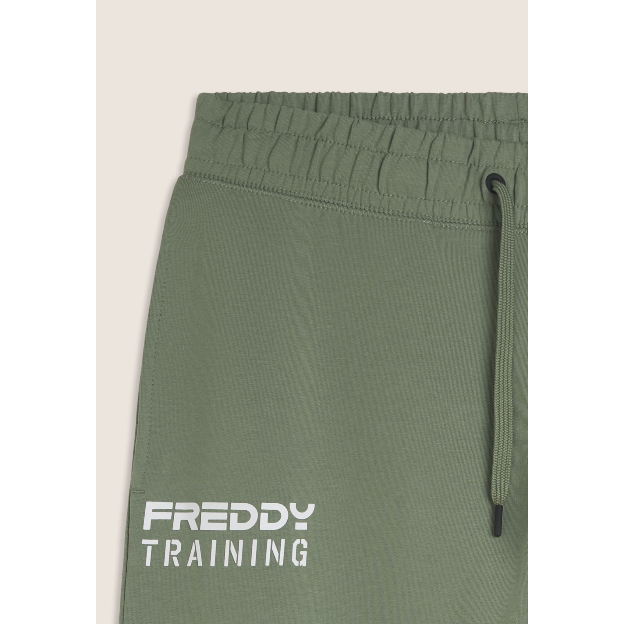 Pantaloni regular con tasca zip sulla gamba