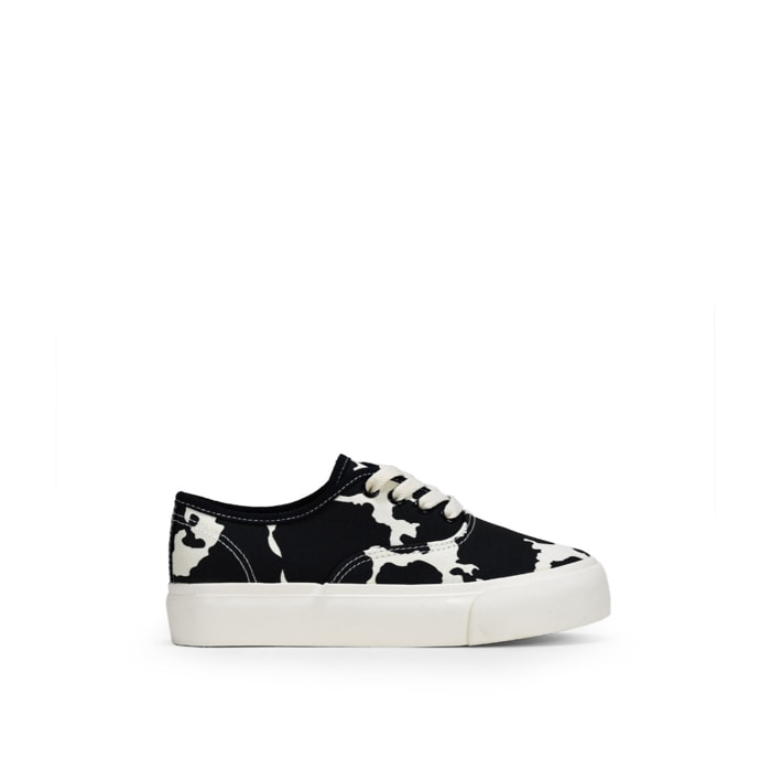 Zapatillas de tela con estampado vaca y plataforma