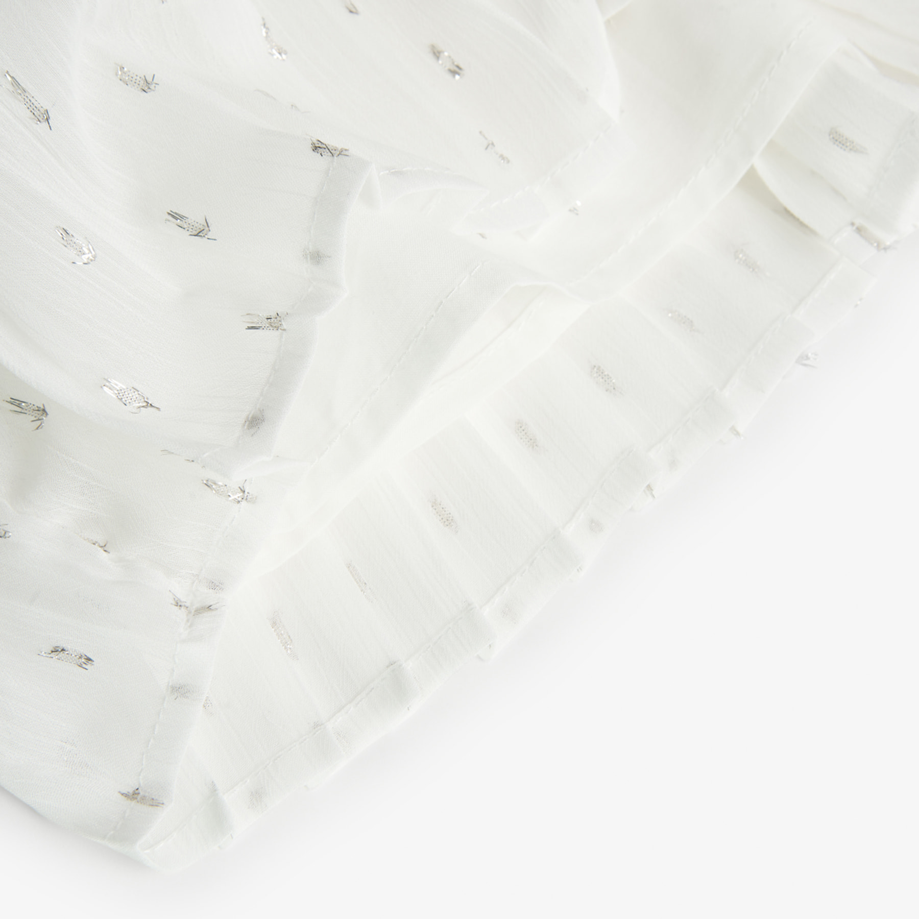 Falda plisada para niña en gasa lisa de color blanco