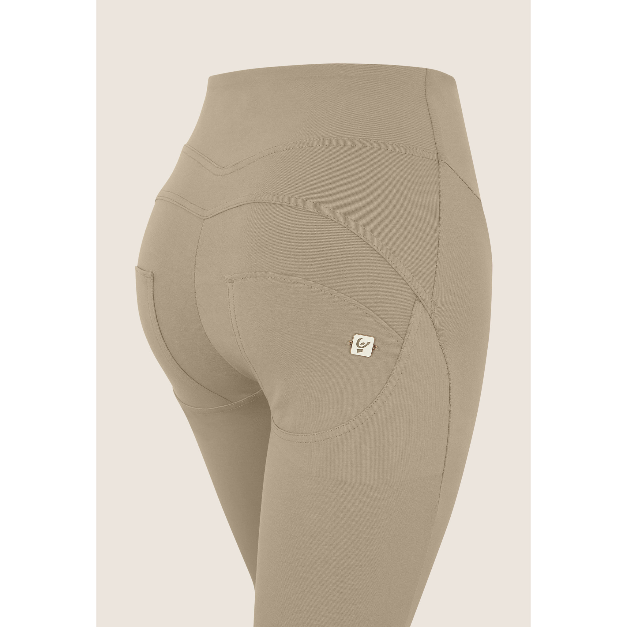 Pantaloni WR.UP flare vita alta in cotone con impunture