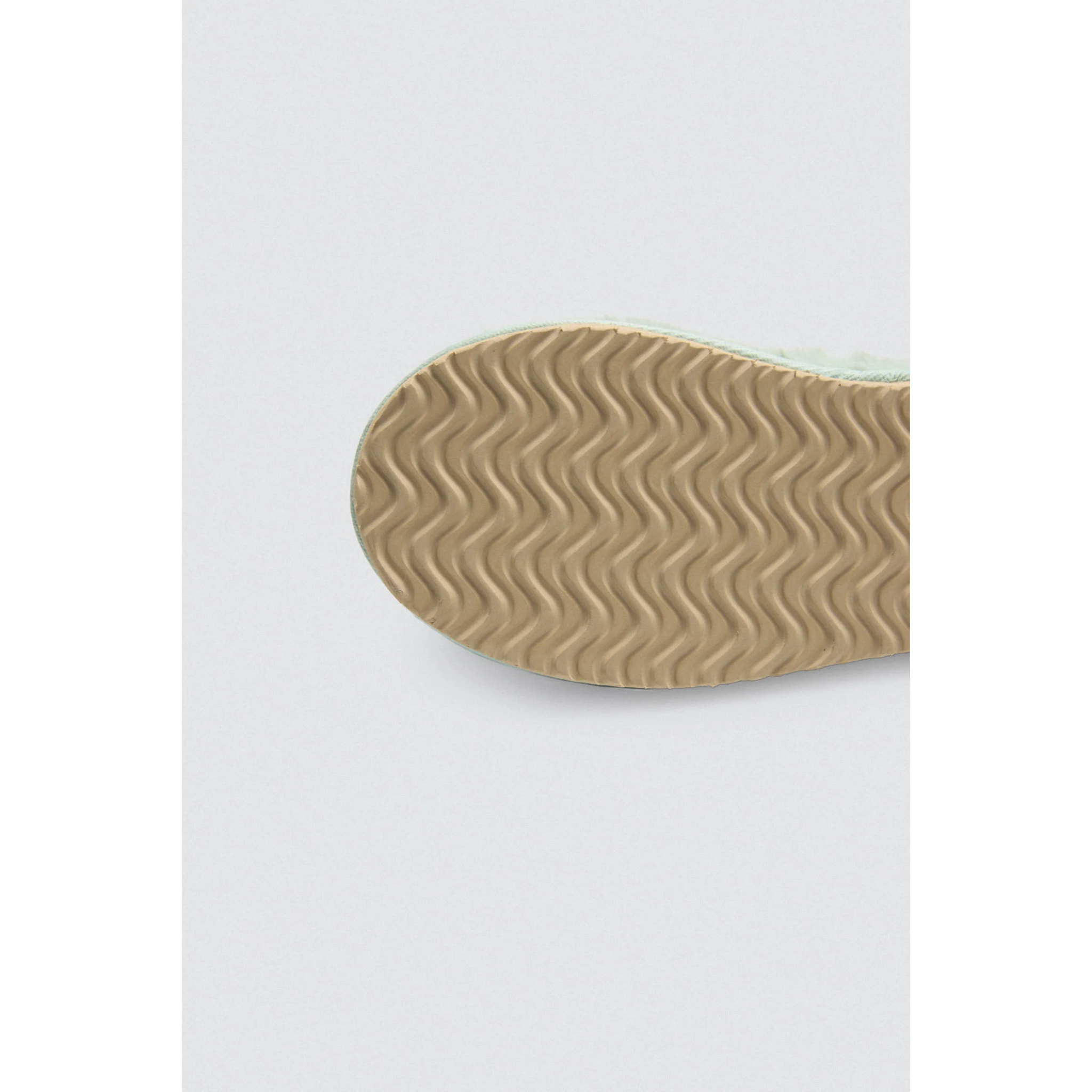 Pantofole con pompon e morbida pelliccia