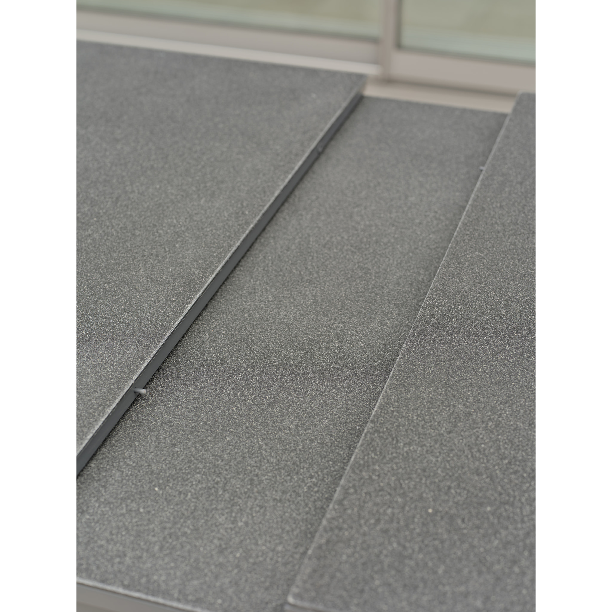 DANIA - Table en alu et spraystone avec rallonge automatique grise anthracite
