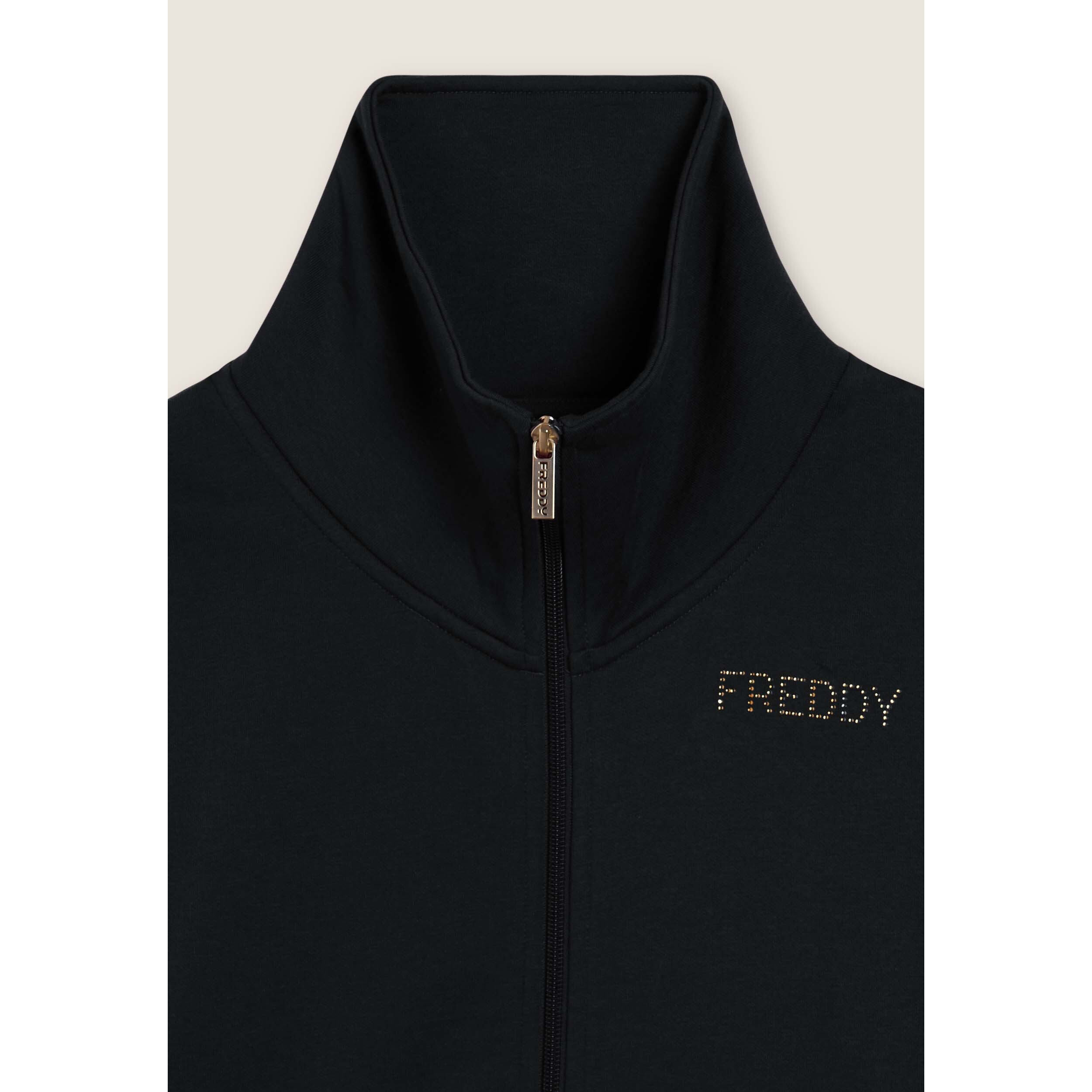 Tuta sportiva collo alto con scritta in strass