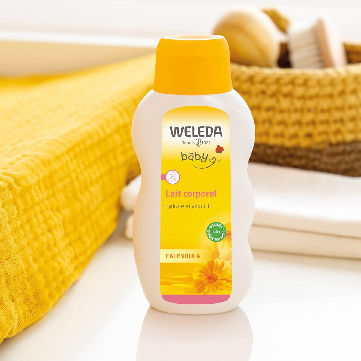 WELEDA - DUO Lait corporel + Crème protectrice visage - Hydratation - pour Bébé - Certifié Natrue ** - Flacon 200ml et Tube 50ml