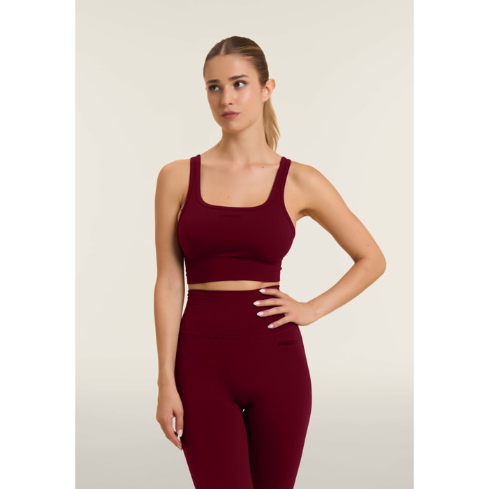 Top sportivo seamless supporto medio con inserti a costine