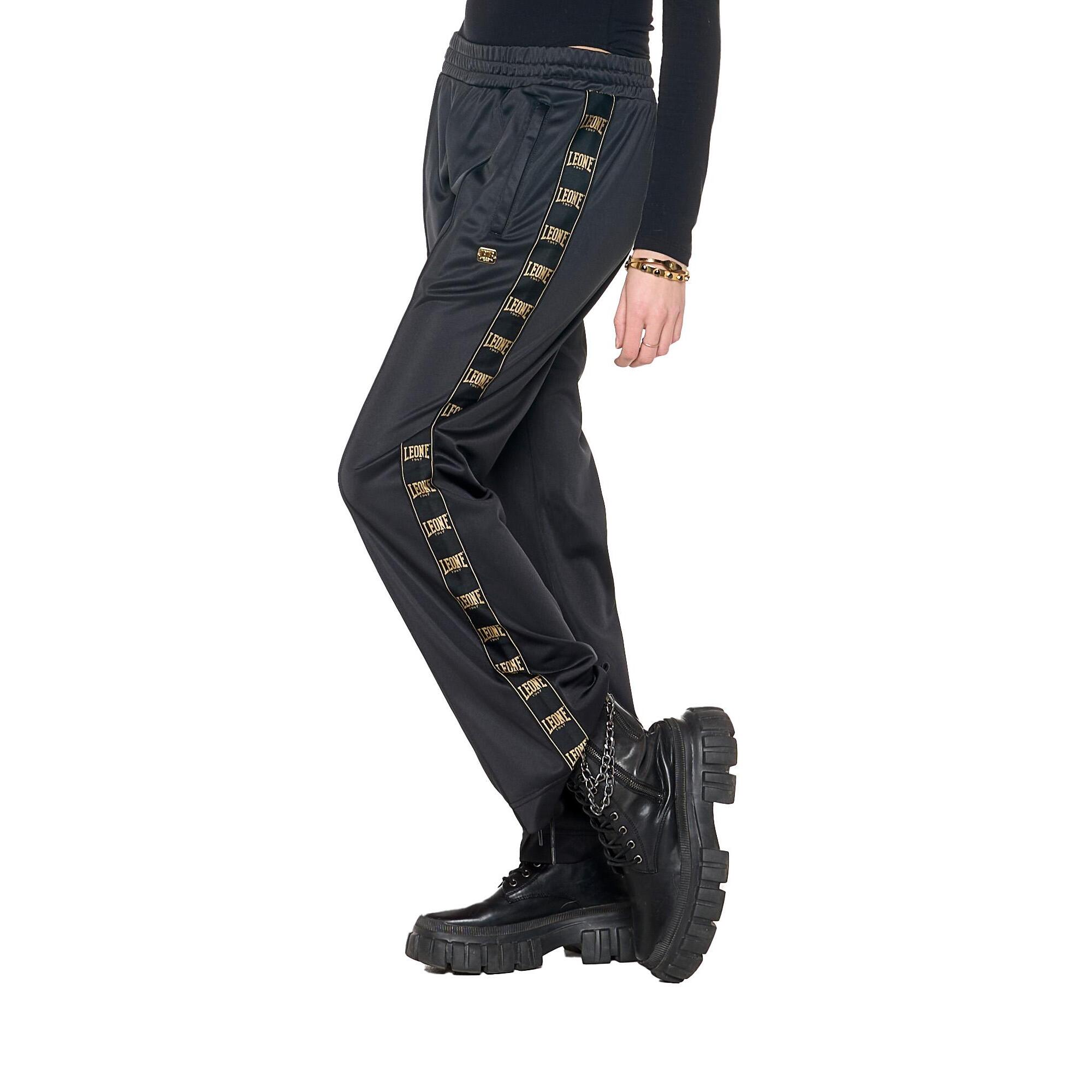 Pantalón deportivo de mujer de invierno con bandas verticales "Authentic Gold"