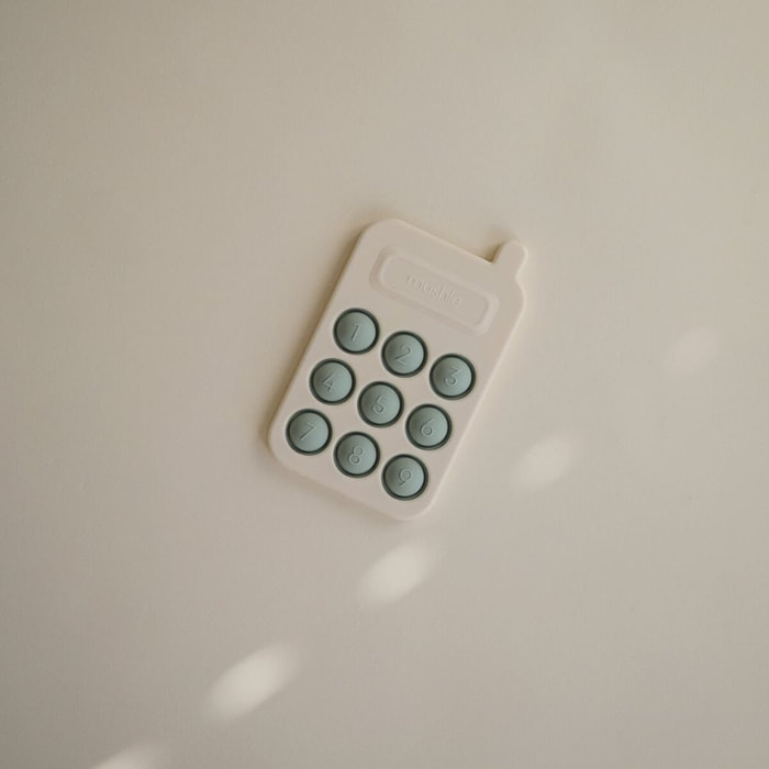 Mushie Pop It Phone