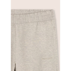 Pantaloni slim mélange con stampa trasparente e zip