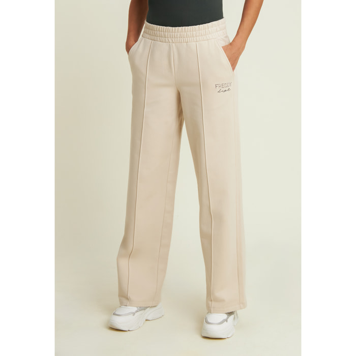 Pantaloni wide leg con cucitura centrale decorativa