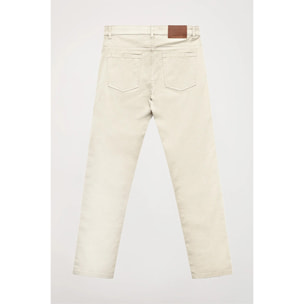 Pantaloni beige a cinque tasche con logo ricamato