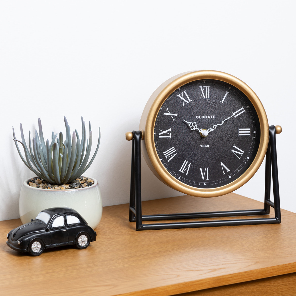 Horloge à poser "Luca" - métal - noir & doré 26x26 cm