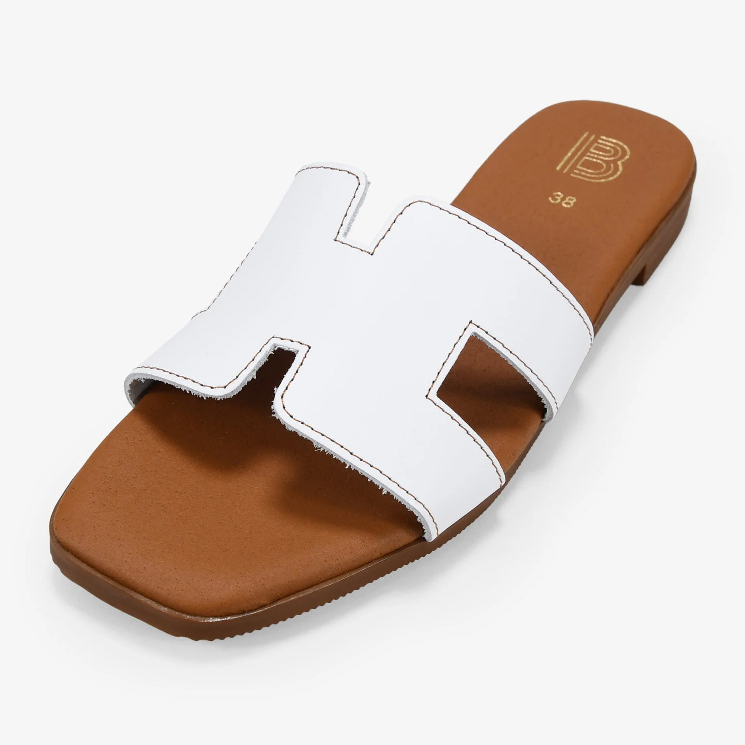 Sandalias planas blancas en piel con plantilla acolchada