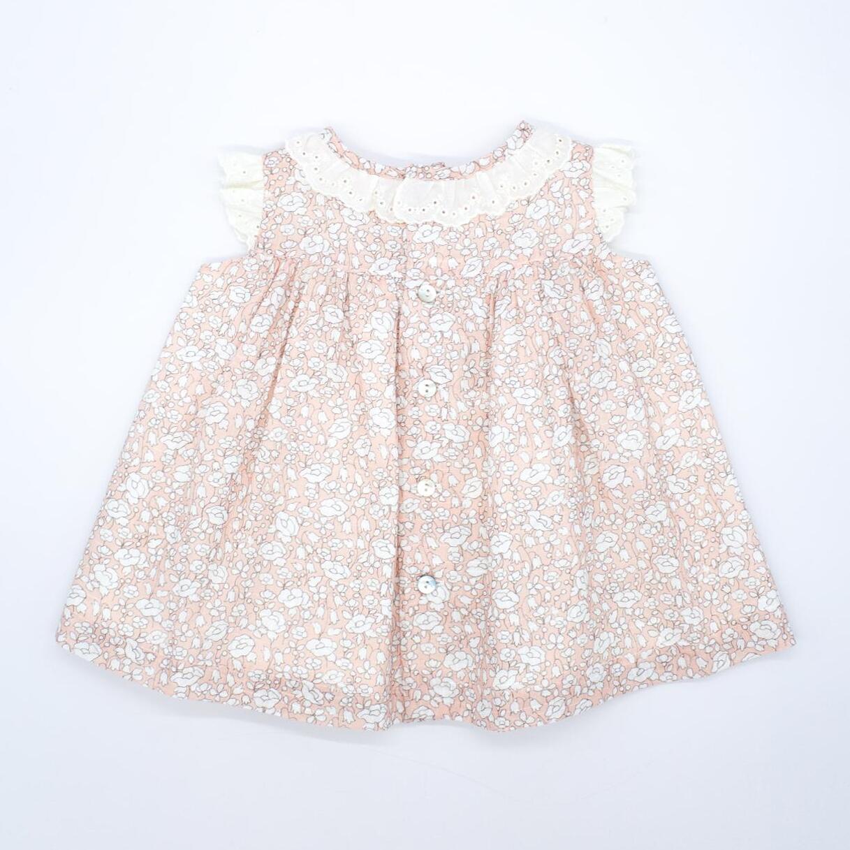 Vestido corto estampado flores rosas, tira bordada en el cuello y las sisas