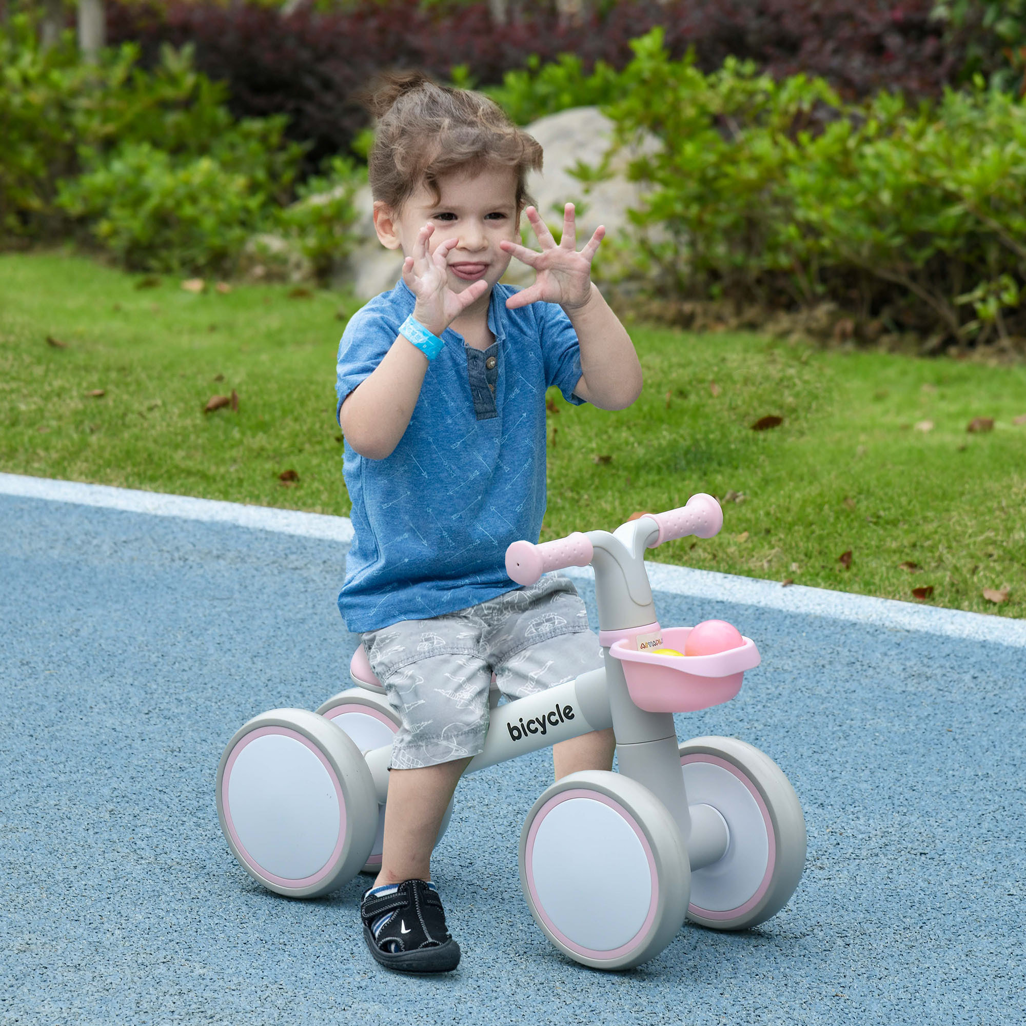 Bicicleta sin Pedales para Niños de 12-36 Meses Bicicleta de Equilibrio con Asiento Ajustable Cesta y 4 Ruedas Silenciosas Carga 20 kg 56x27x39 cm Rosa
