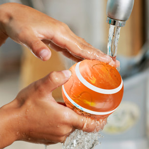 DAM Bola rebotadora. Juguete interactivo inteligente para perros y mascotas. Luz activada por movimiento. 8x8x8 Cm. Color: Naranja