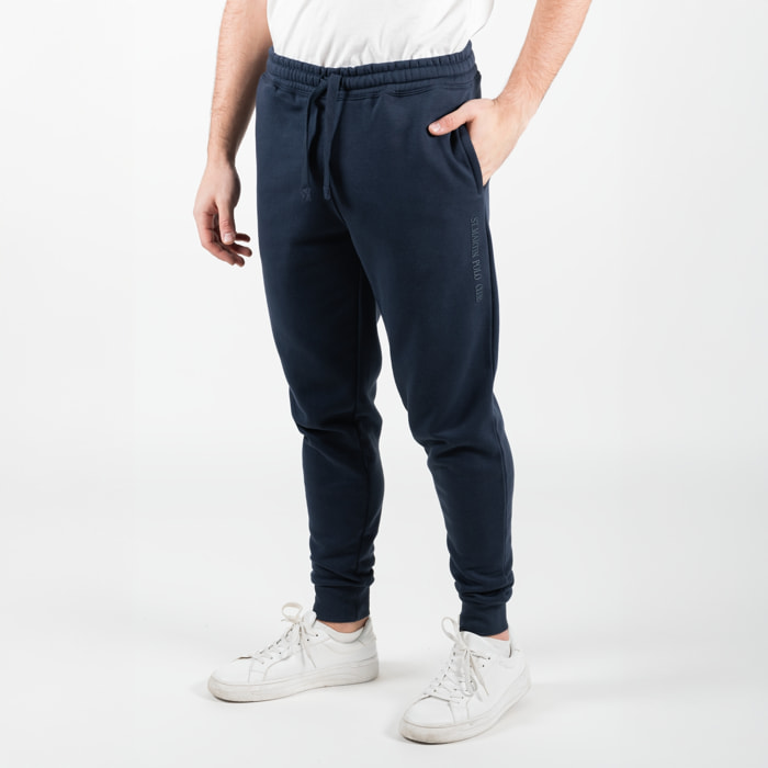 Patalone felpato in pile con patch della bandiera americana cucita sulla tasca posteriore