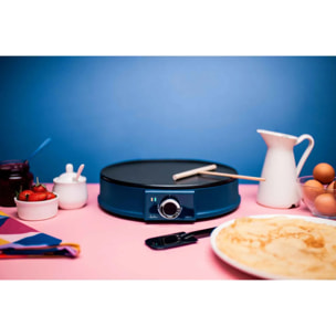 Crepera eléctrica JATA JECR1000 con superficie de 30 cm de diámetro. Incluye espátula y esparcidor