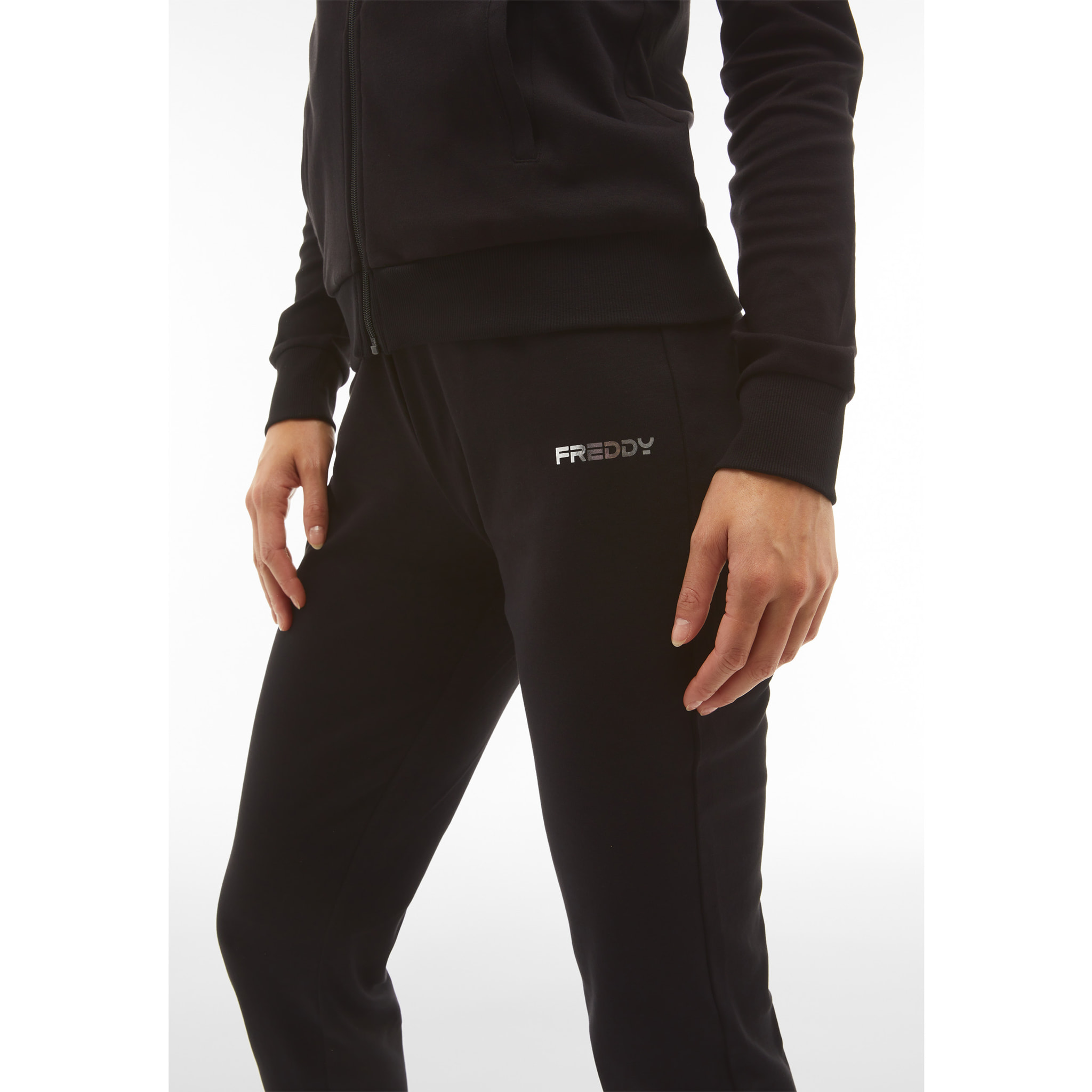 Tuta sportiva in interlock con felpa cappuccio e zip
