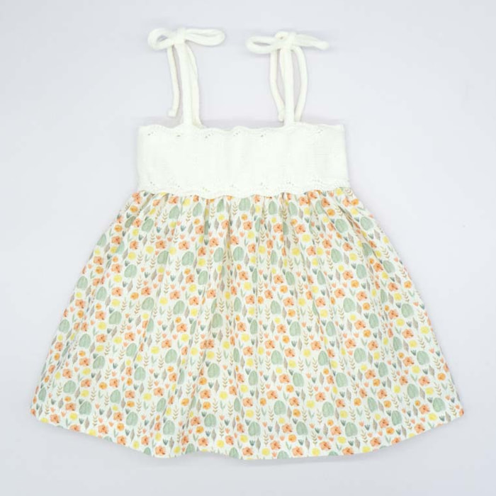 VESTIDO CUERPO DE TRICOT CRUDO Y FALDA DE HOJAS