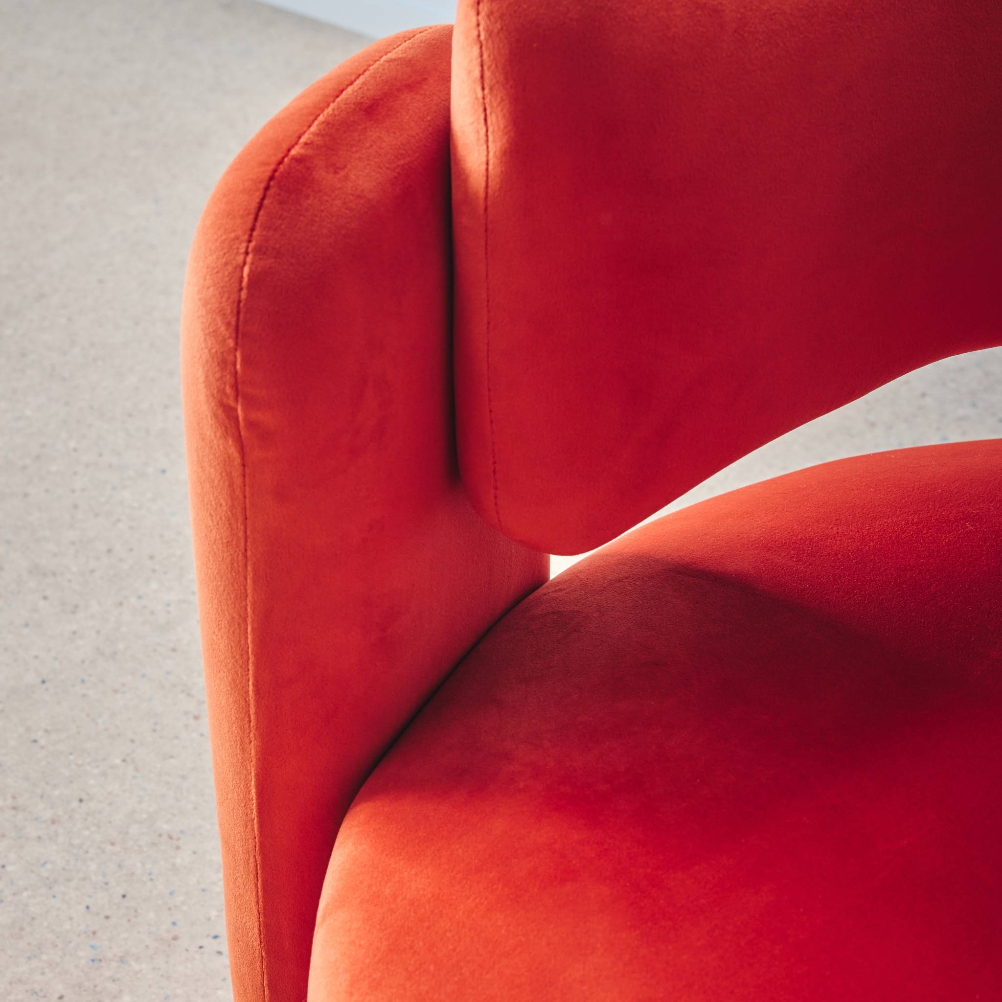 Fauteuil tripode en velours orange