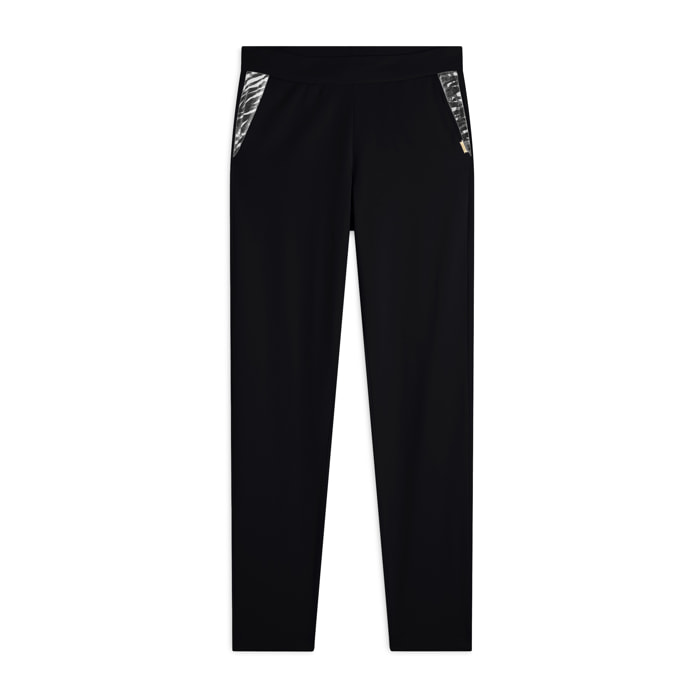 Pantaloni in jersey con apertura tasche animalier