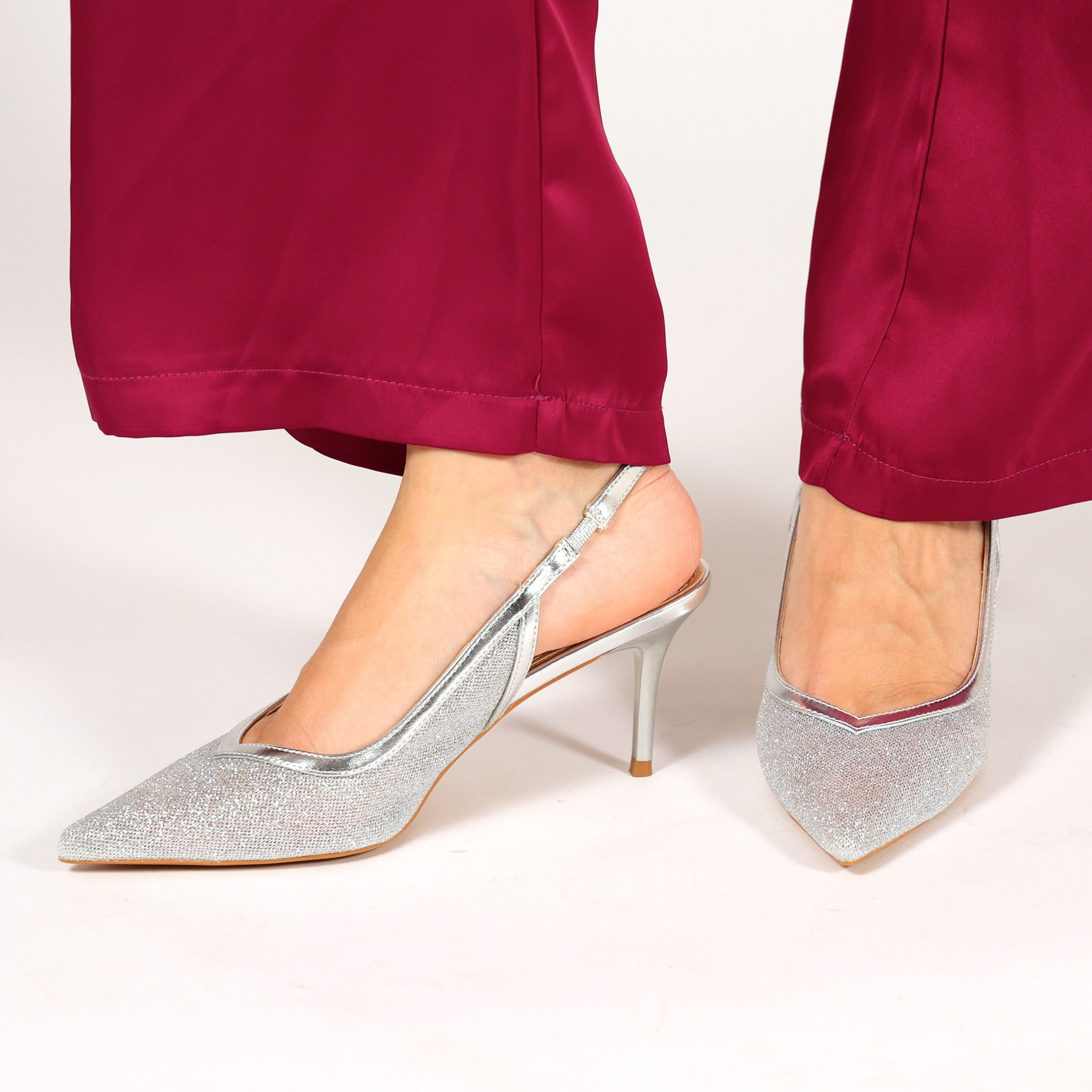 Dècolletè in simil pelle brillantinati