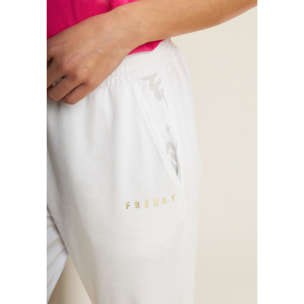 Pantaloni con elastico sul fondo e dettagli floreali