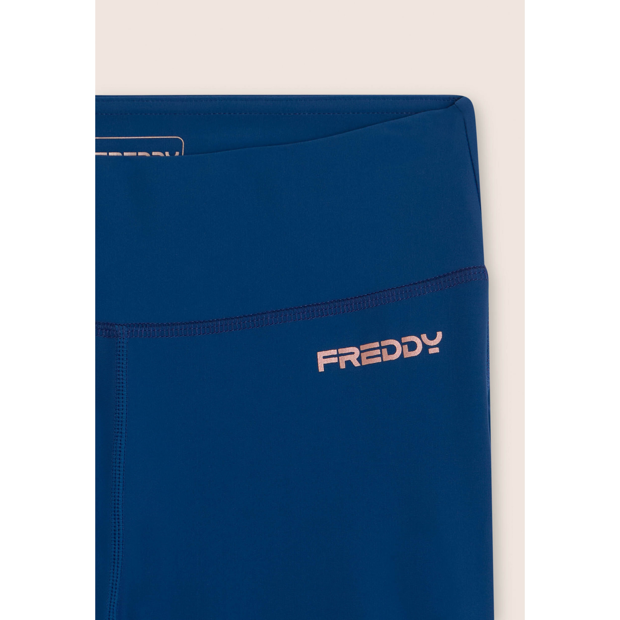 Leggings sportivi a zampa con vita alta e tasca interna