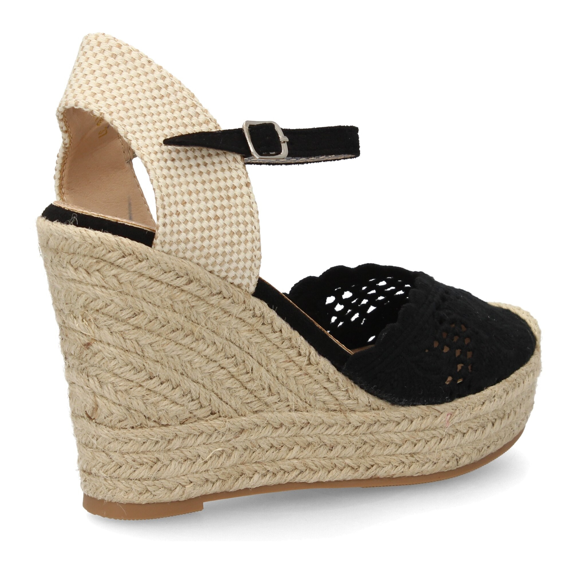 Alpargata cuña destalonada con calados para mujer.