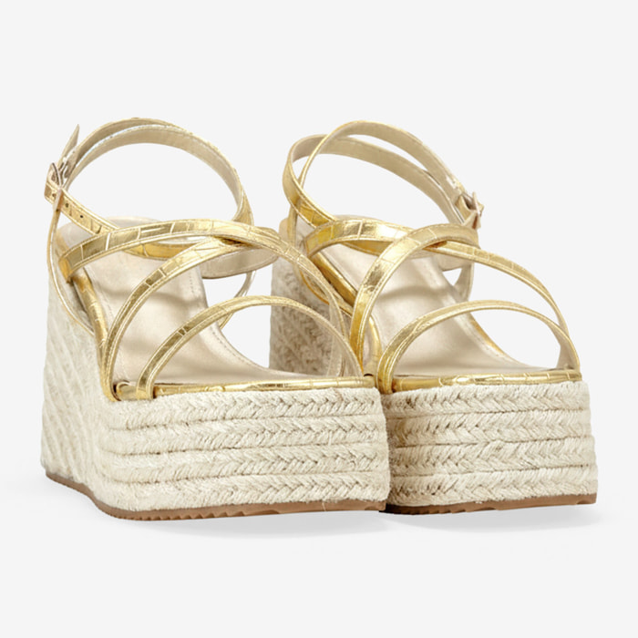 Sandalias de cuña doradas con plataforma de esparto