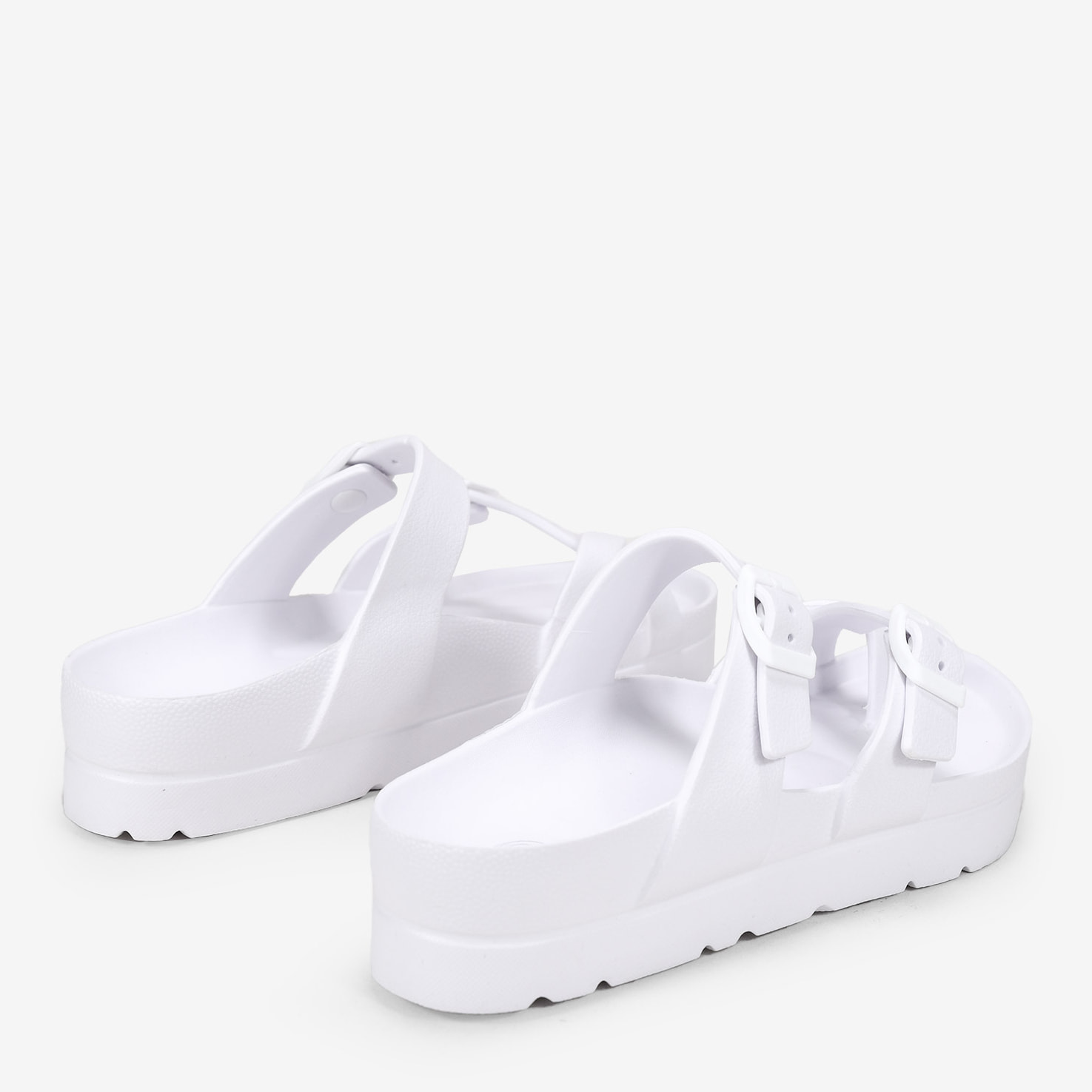 Sandalias blancas de goma con plataforma