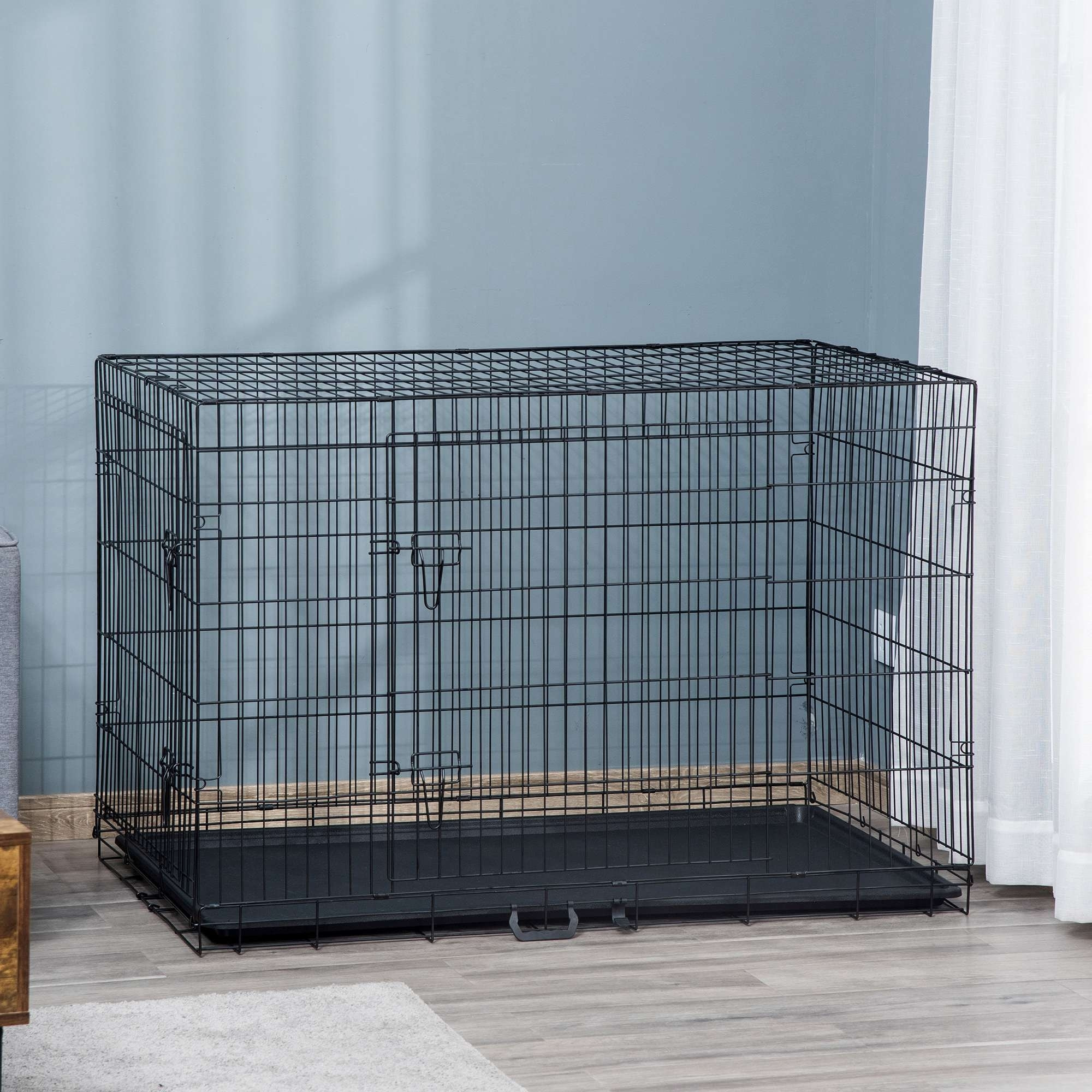 Cage de transport pour chien pliable - 2 portes verrouillables - plateau amovible - dim. 121L x 77l x 82H cm - acier ABS noir