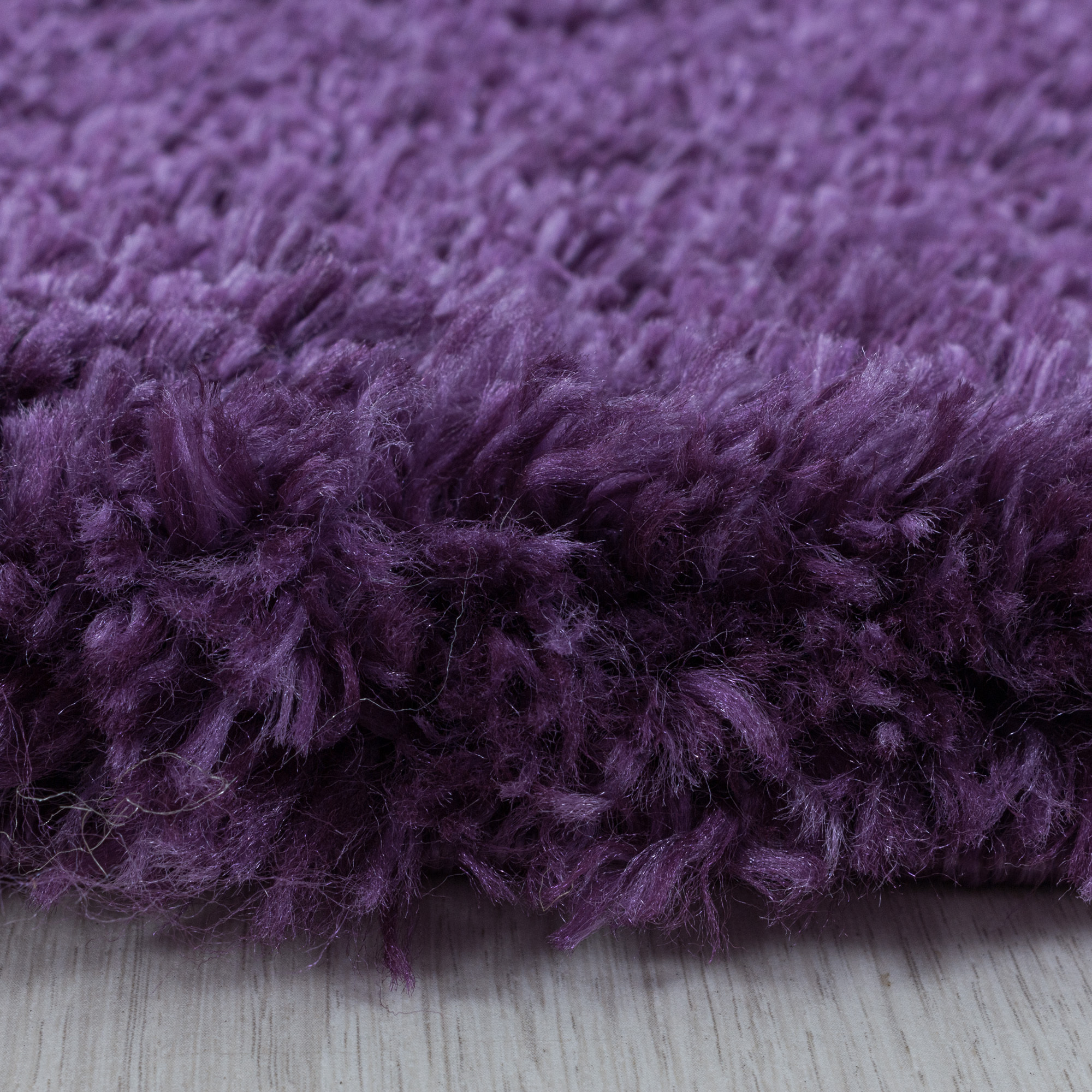 FLUFFY - Tapis rond shaggy uni à poils longs Lila