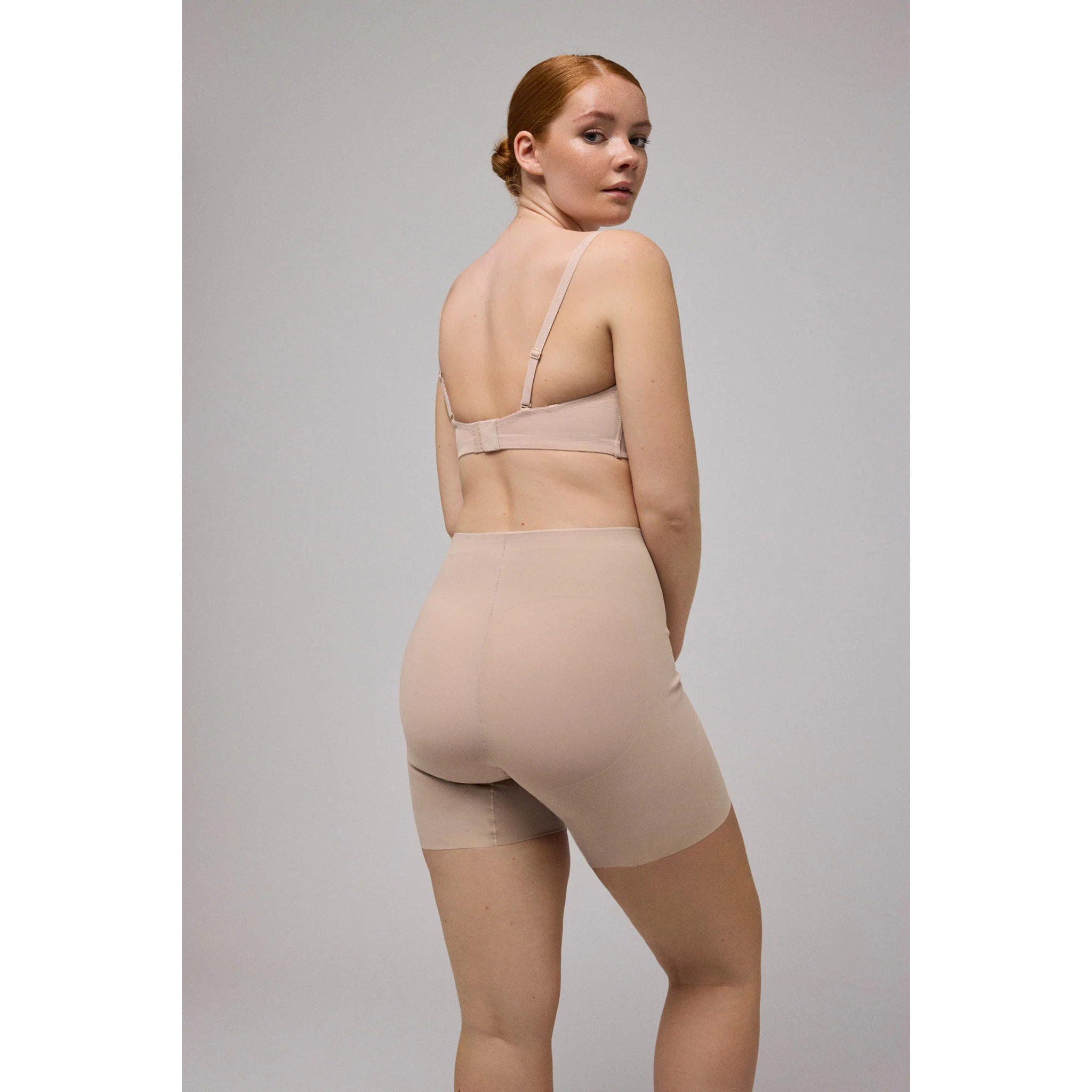 Guaina dimagrante a compressione tagliata al laser beige