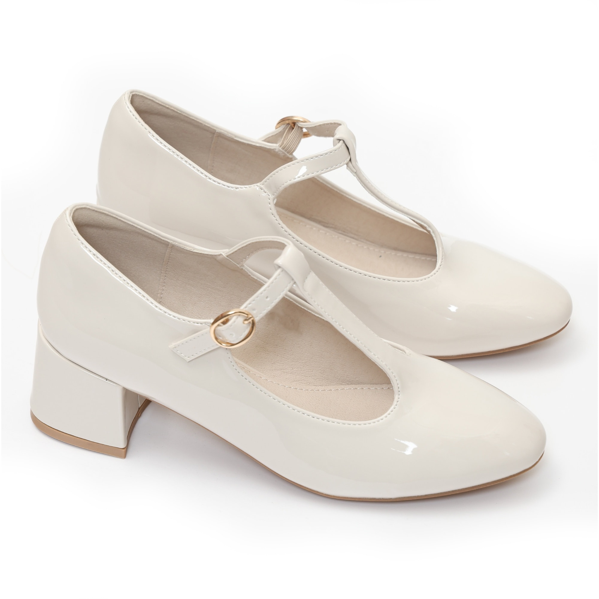 Dècolletè in simil pelle verniciata con tacco basso quadrato