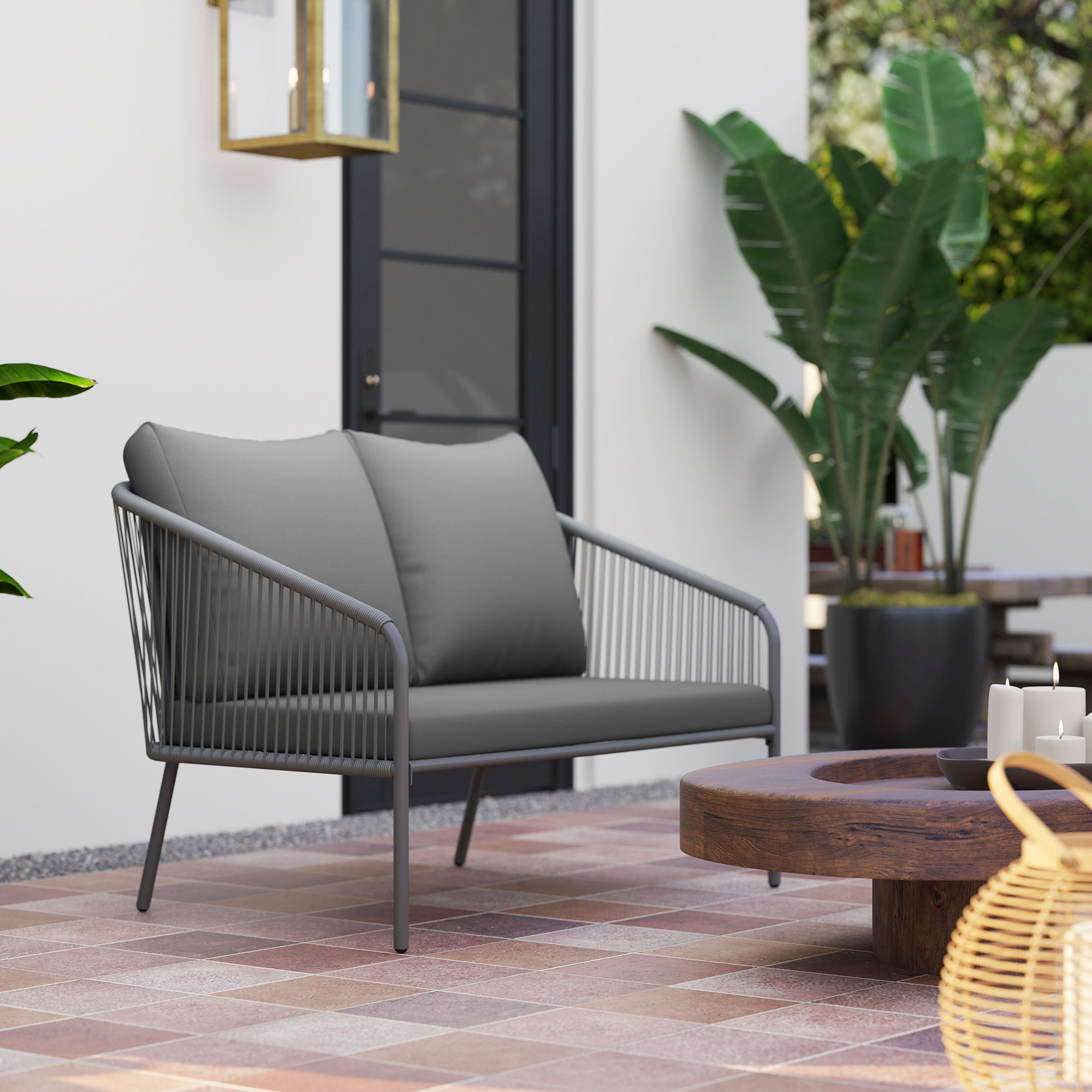 Canapé de jardin 2 places style bohème chic avec coussins assise dossier acier résine filaire gris