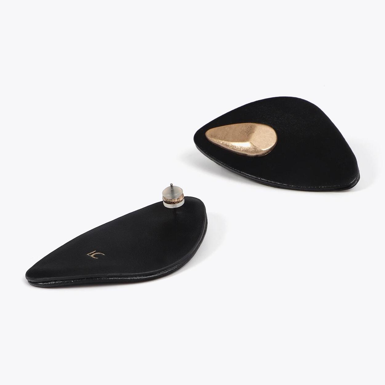 Orecchini grandi effetto pelle con pezzo metallico