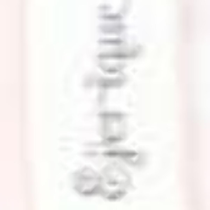 Vestido de lino rosa con pieza en el bajo blanca. Lorzas en la parte del pecho.