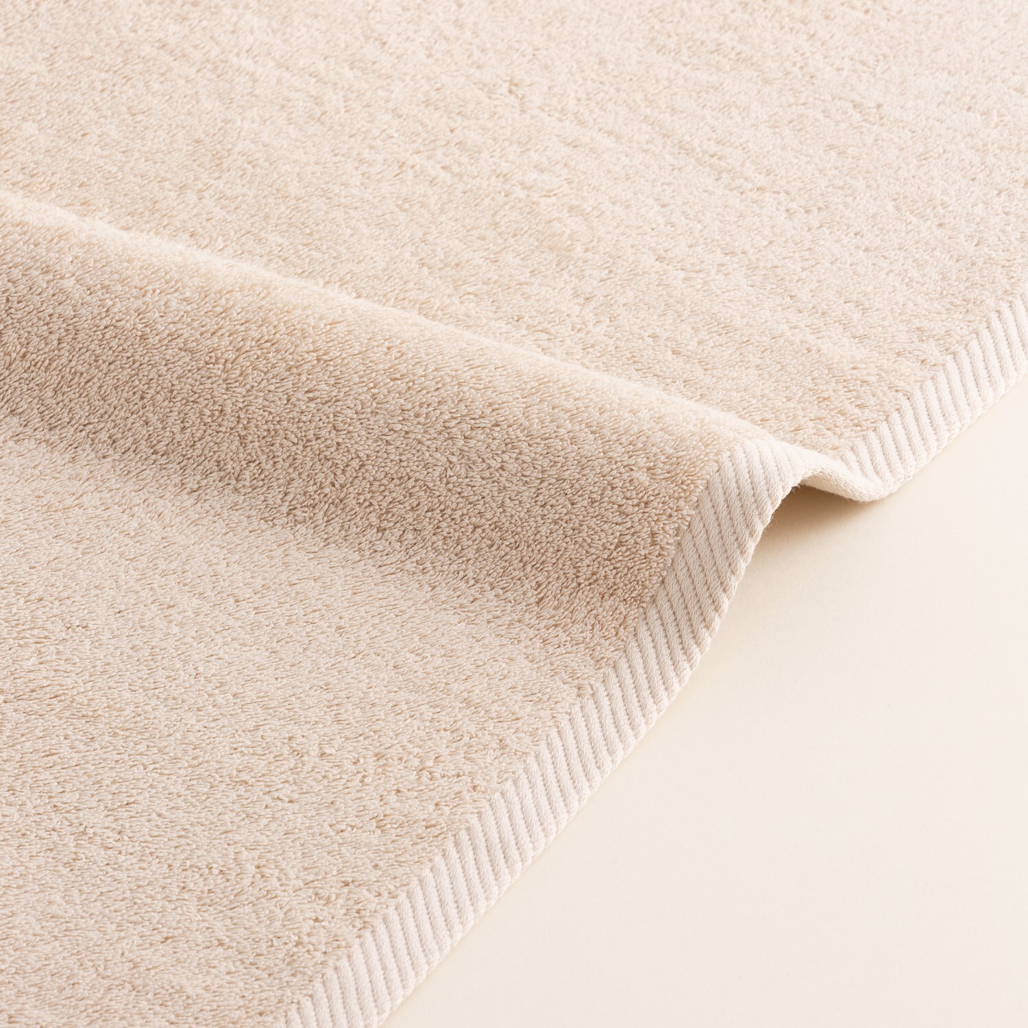 Serviette éponge 100% Coton Peigné - 600 g/m2 NATUREL