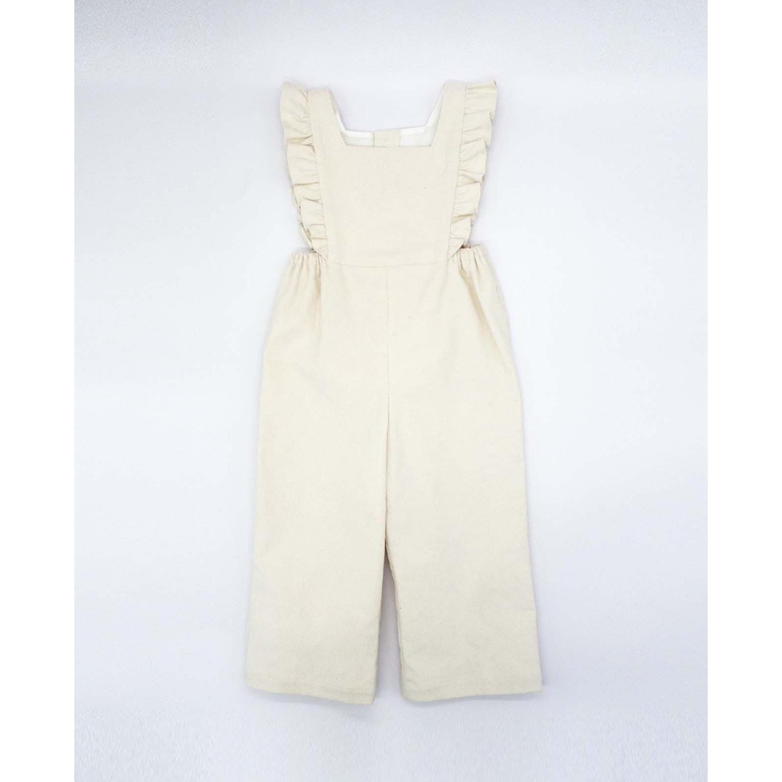 Peto con volantes blancos