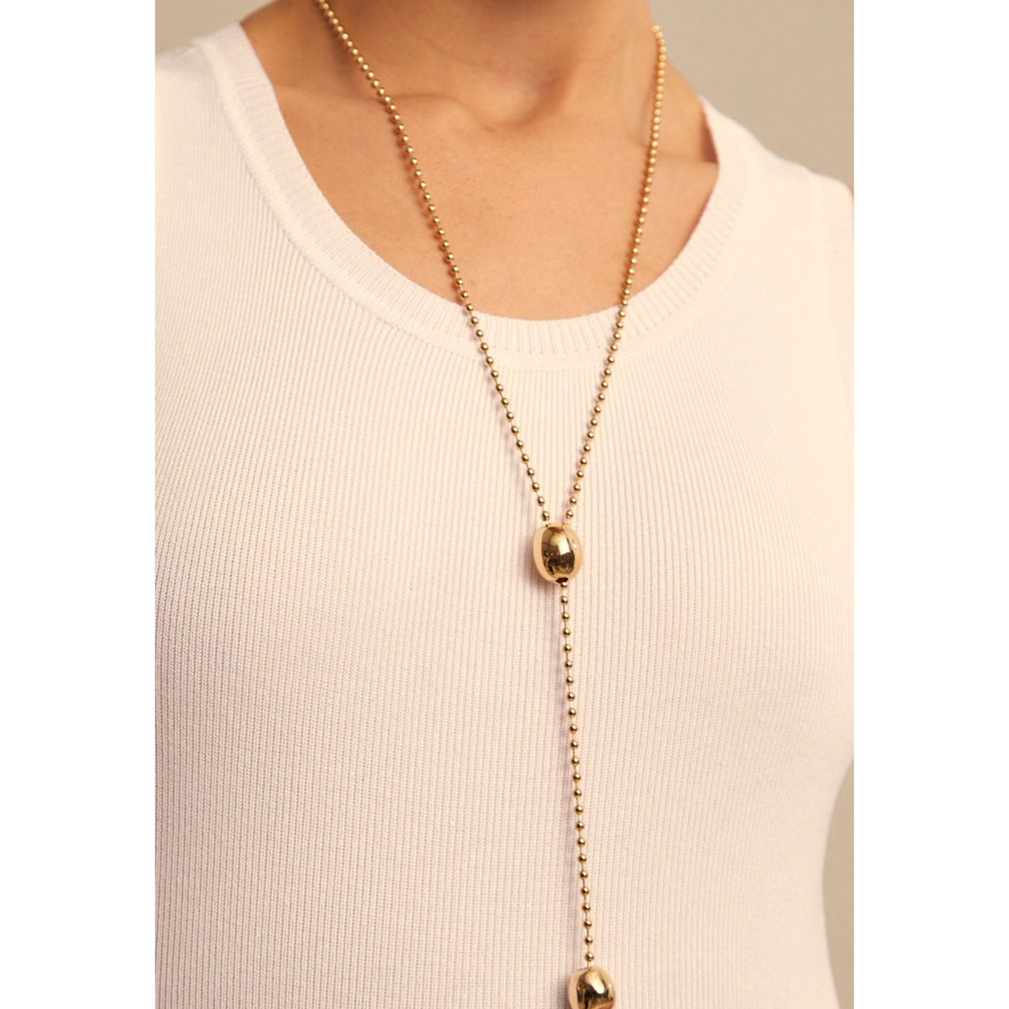 Colgante Lonely Planet DORADO U