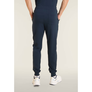 Pantaloni slim in interlock con maxi logo in rilievo