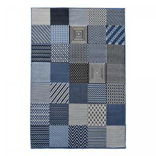 Tapis Dufi motif géométrique différentes teintes de bleu