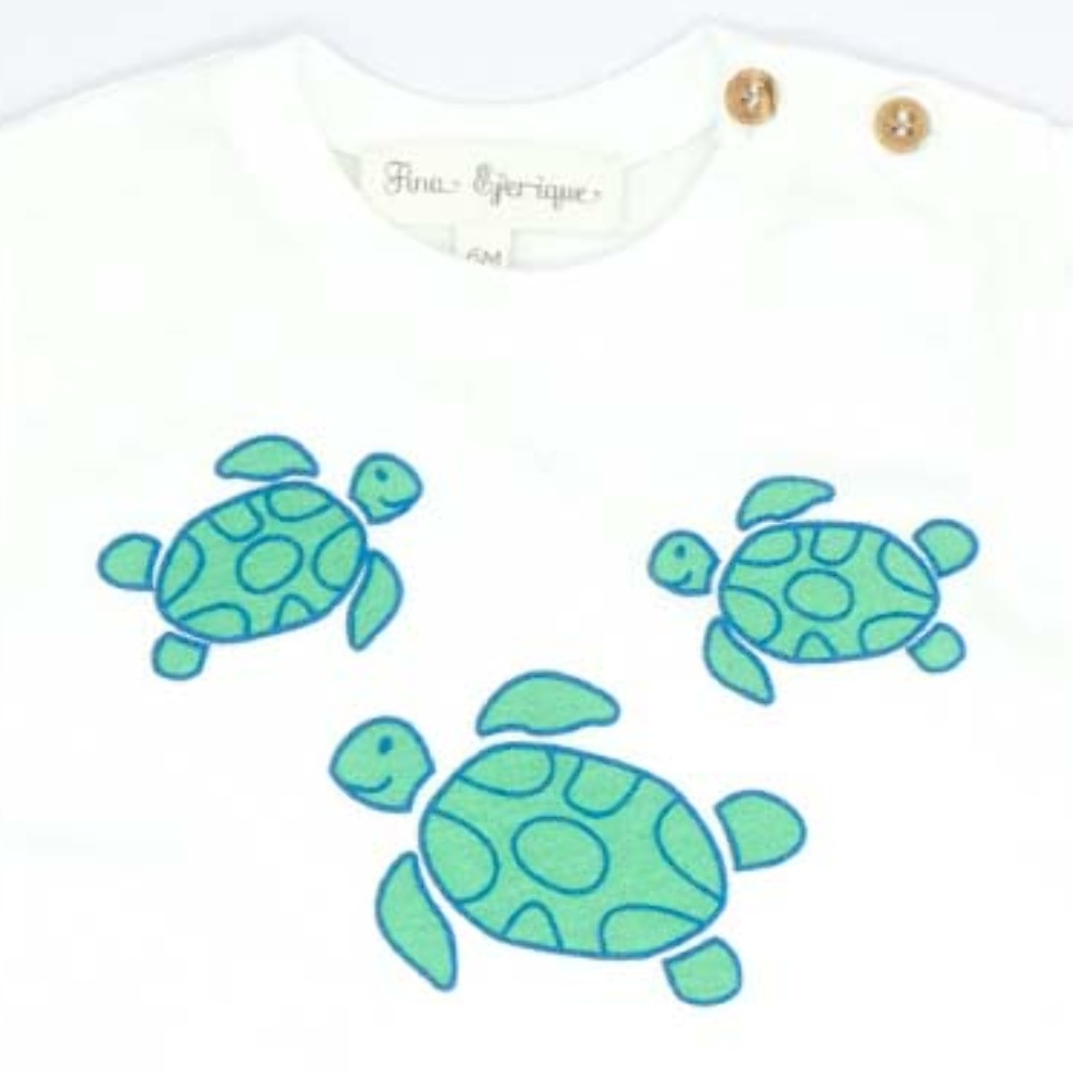 CAMISETA BLANCA TORTUGAS VERDES