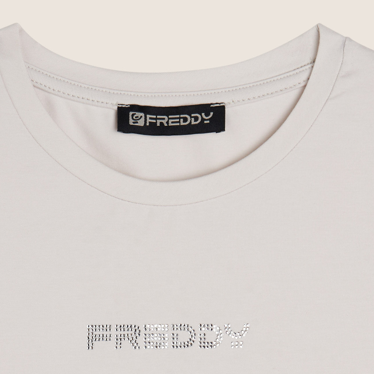 Body senza maniche in jersey stretch con logo strass