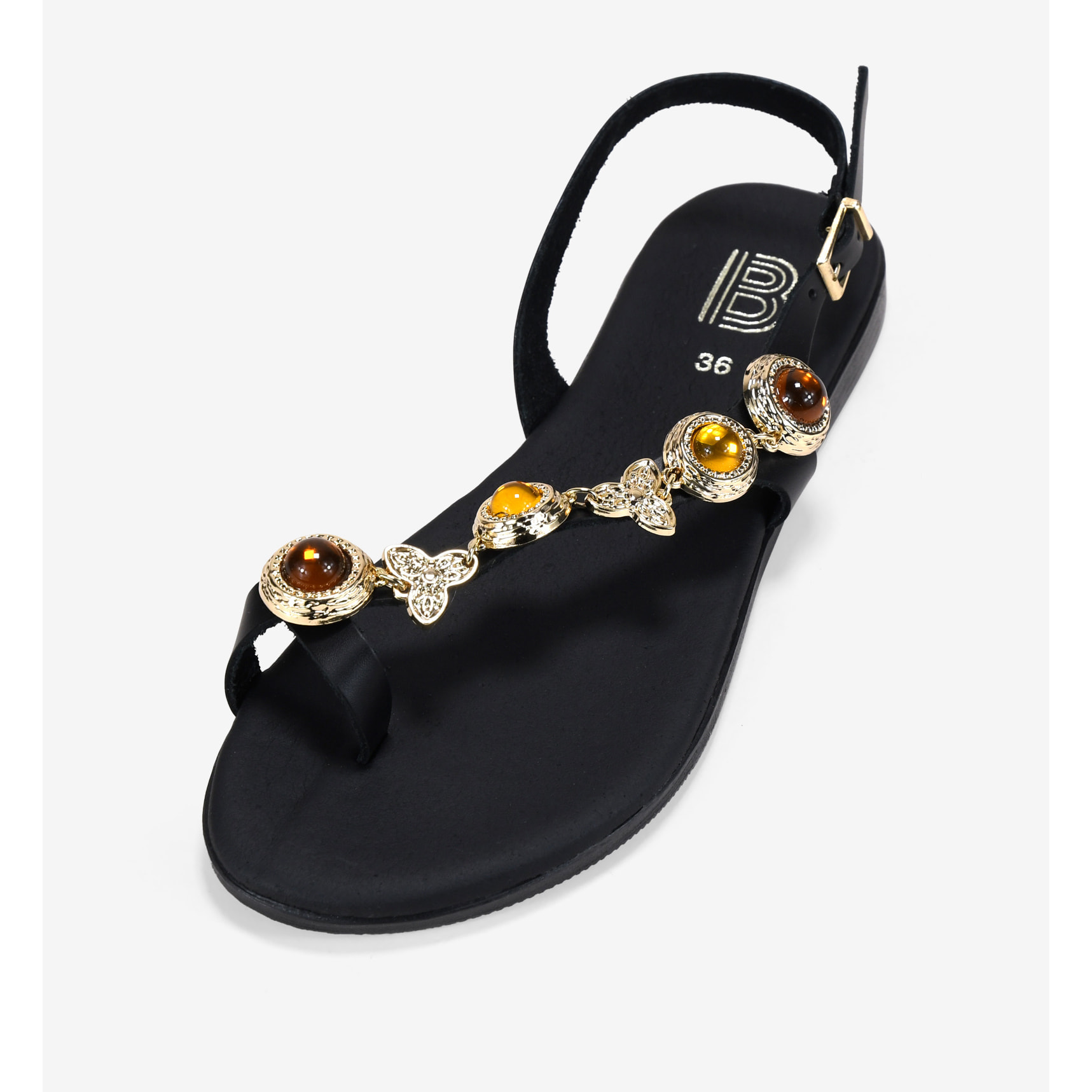 Sandalias planas negras en piel con tira joya