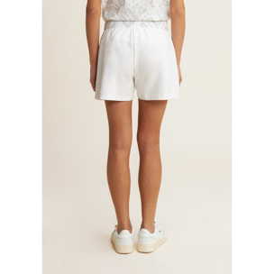 Short sportivi con fascia in vita floreale