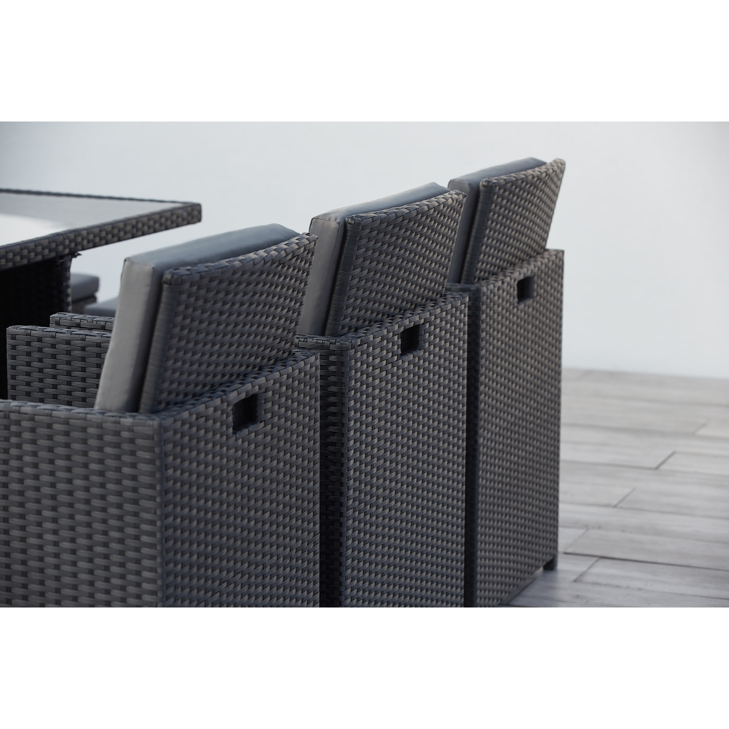 Table et chaises 10 places encastrables en résine noir/gris DALMA