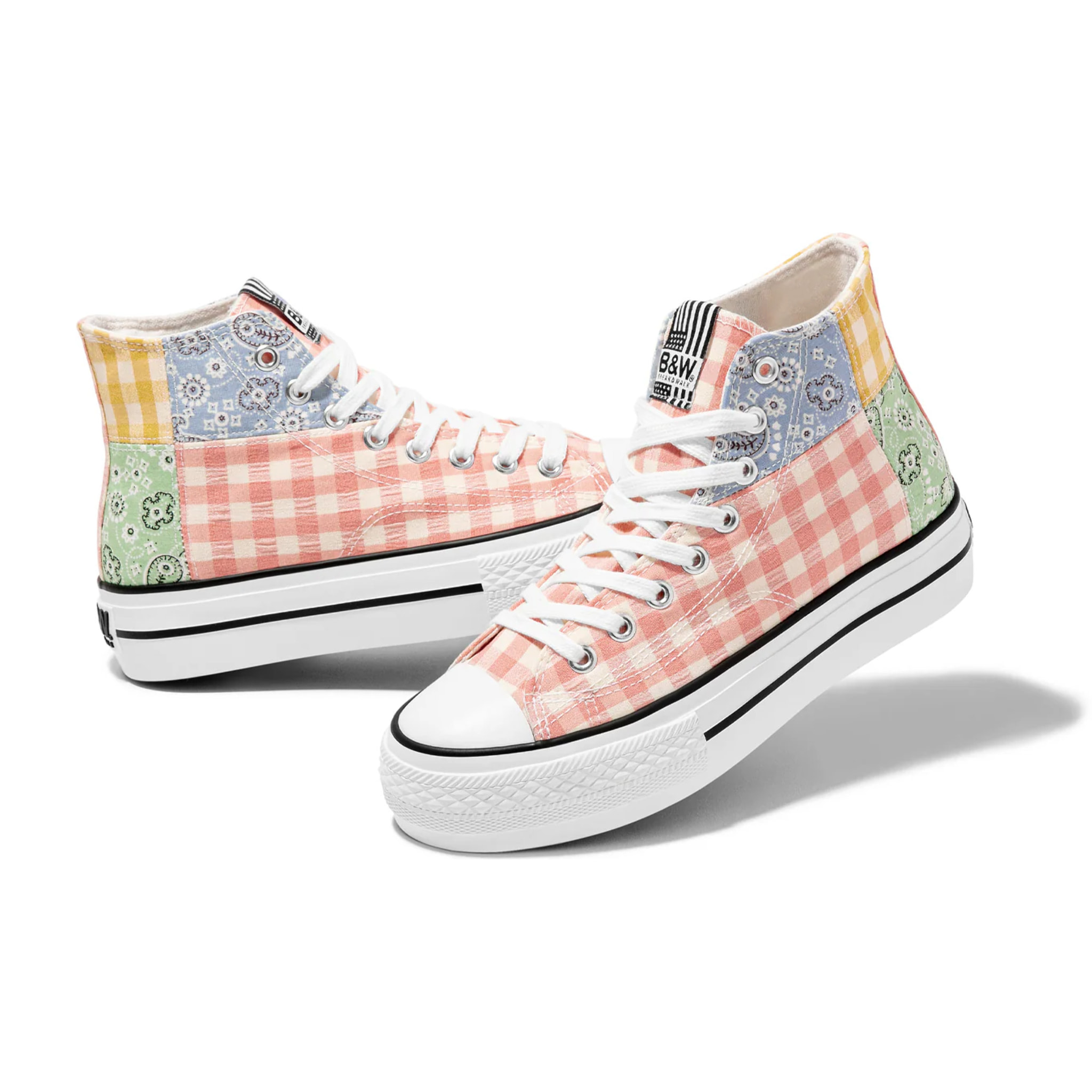 Sneaker alta con doppia piattaforma, design multi-patchwork, nero e bianco