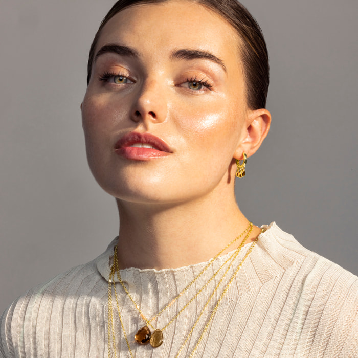 Pendientes de Circonita Esmeralda acabados en oro amarillo de 18k